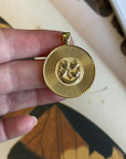 Video of Gold Lucky Coin Pendant Shown Front and Back
