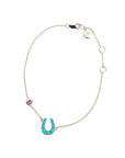 Gold delicate chain bracelet with horseshoe with turquoise stones and pink tourmaline accent on chain