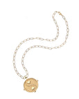 Gold Balance Coin on Drawn Link Chain