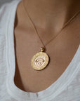 Model wearing gold original Virgo coin pendant