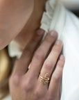Model wearing gold snake ring