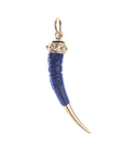 Carved lapis tusk with gold tip and gold setting
