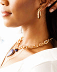 Model wearing the protect tusk hoops