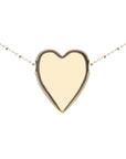 Gold heart pendant on satellite chain