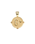 Gold letter G coin pendant with star detail