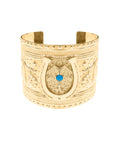 Gold cuff with horseshoe and 4 leaf clover with turquoise accent