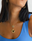 Layered gold necklaces