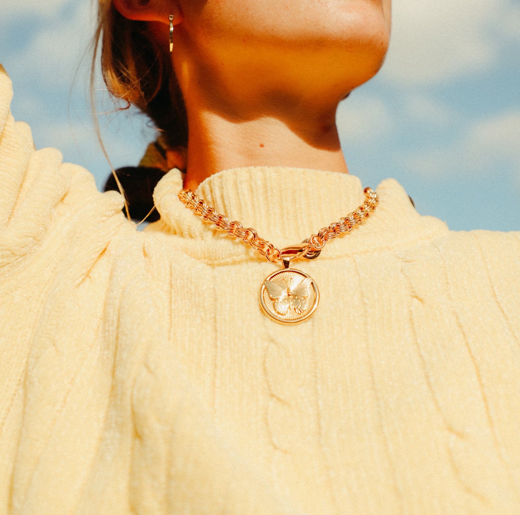 Gold Coin Necklaces Layered on Model