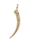 Gold tusk pendant with textured details