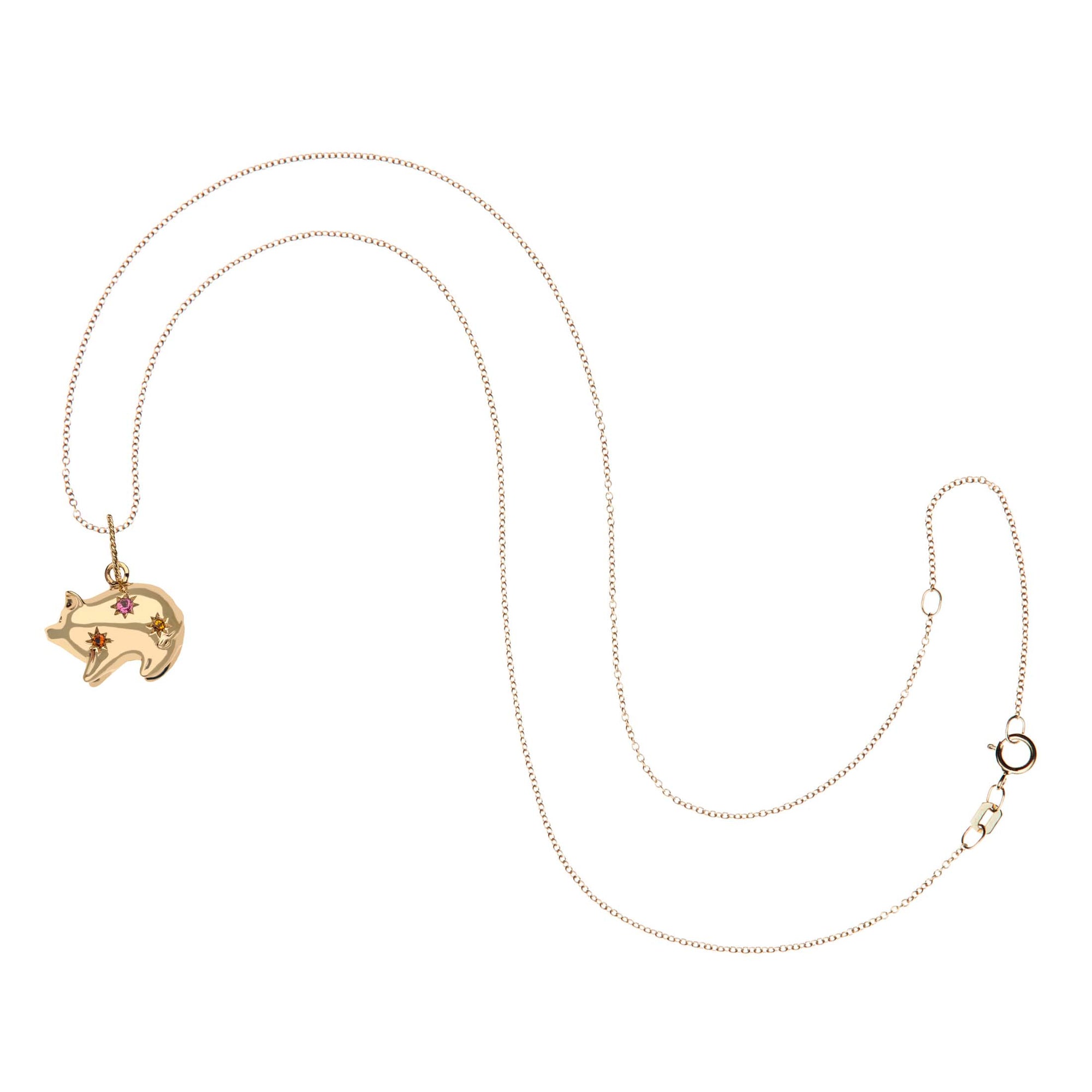 Gold pig pendant on 10 karat adjustable chain