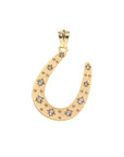 Gold horseshoe pendant with white topaz star details