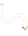 Three heart pendants on 18 karat beaded satellite chain