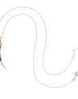 Carved lapis tusk on 10 karat adjustable chain