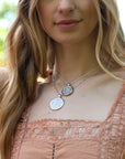 Silver Coin Necklaces Layered on Model