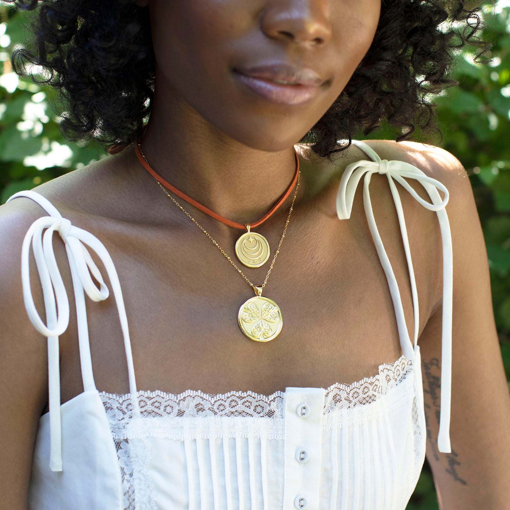 Gold Necklaces Layered on Model