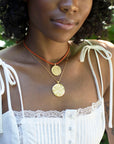 Gold Necklaces Layered on Model