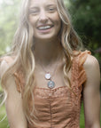 Silver Coin Necklaces Layered on Model