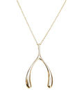 Gold wishbone pendant