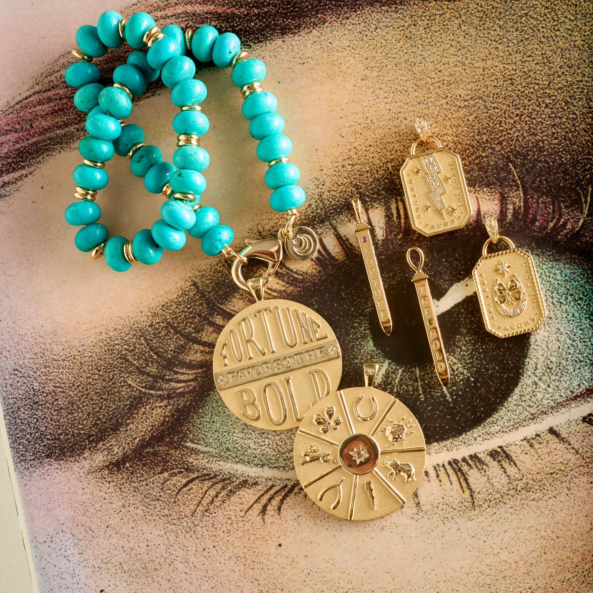 Stylized shot of lucky pendants and stone collector beaded necklace in turquoise on top of an illustration of an eye