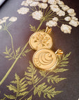 Stylized shot of forever 2026 coins on an illustration of a flower