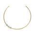 Gold neck cuff features three bezel set white CZ stones that sit off center