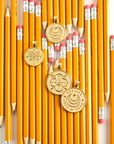 Stylized shot of gold forever 2025 coins with pencils