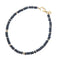 Obsidian beaded necklace with gold bead accents and oversized gold lobster clasp