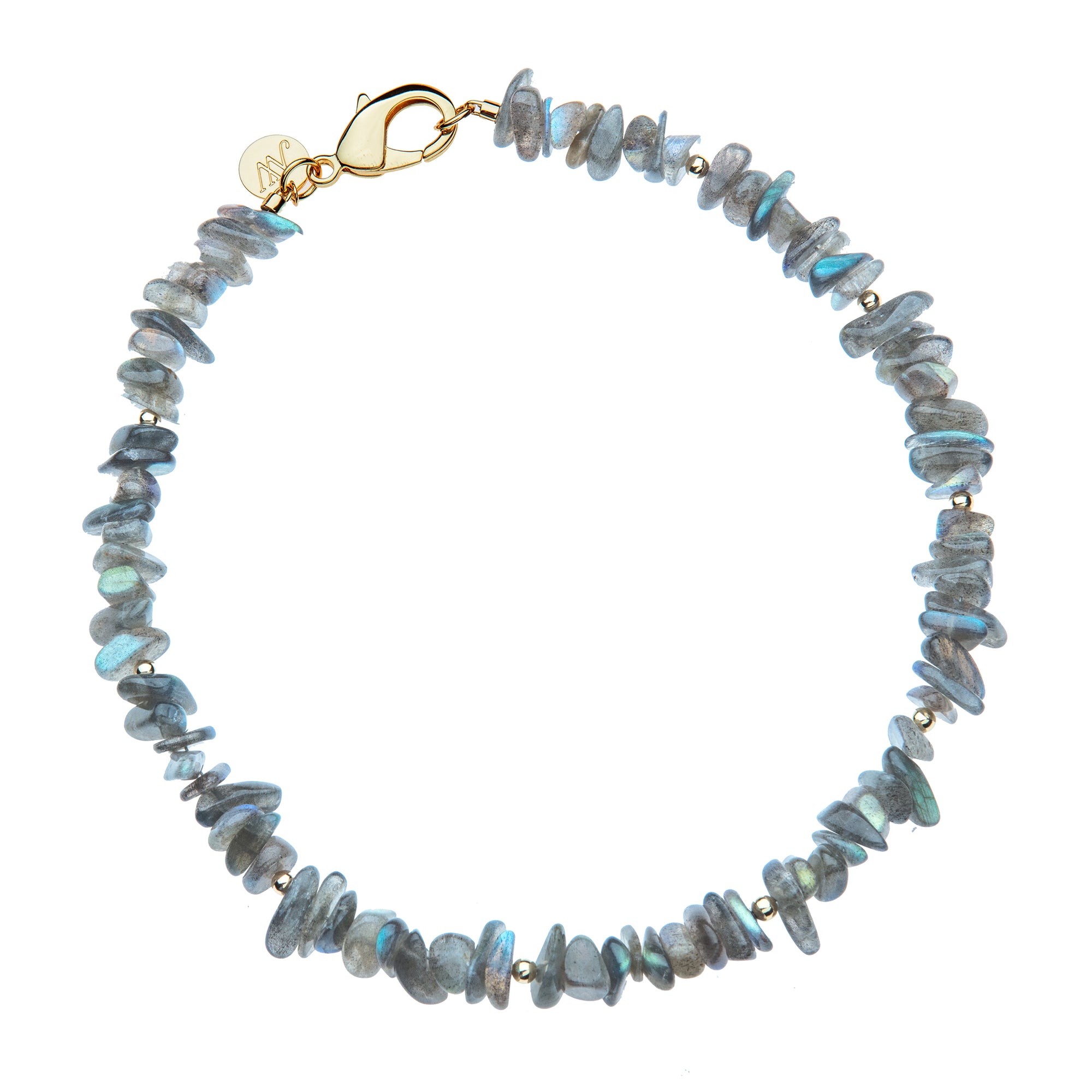 Beaded necklace features naturally shaped labradorite beads in shades of gray, small gold beads interspersed, and an oversized gold clasp