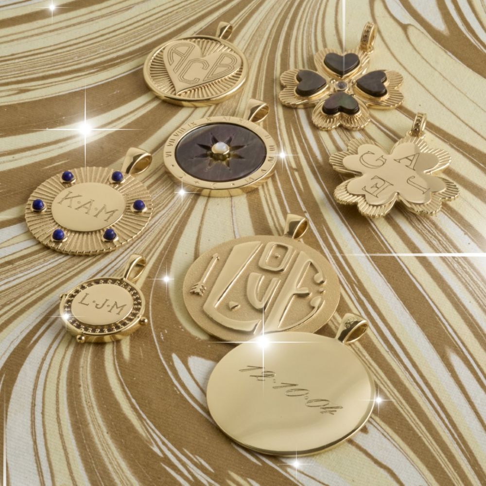 Assorted coin pendants and charms