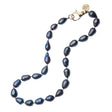 Black pearls on black knotted thread with gold lobster clasp