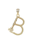 Gold letter B pendant with flower detail and white topaz accents on the bail
