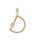 Gold letter D pendant with flower detail and white topaz accents on the bail