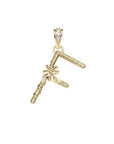 Gold letter F pendant with flower detail and white topaz accents on the bail