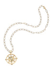 Gold guiding star pendant on drawn link chain