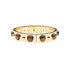 Gold hinged cuff bracelet featuring tiger's eye cabochons on the outside and roman numerals with star details on the inside.