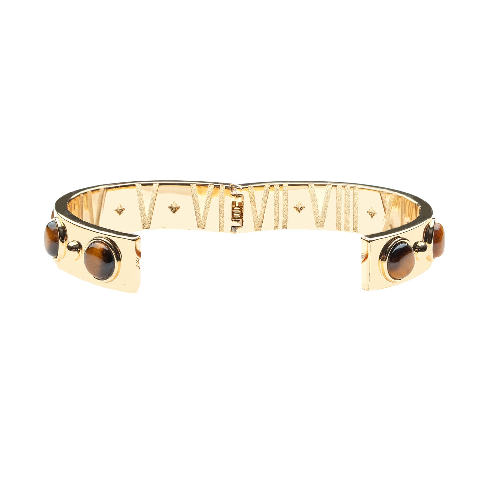 Hinged cuff shown open to show roman numerals on the inside