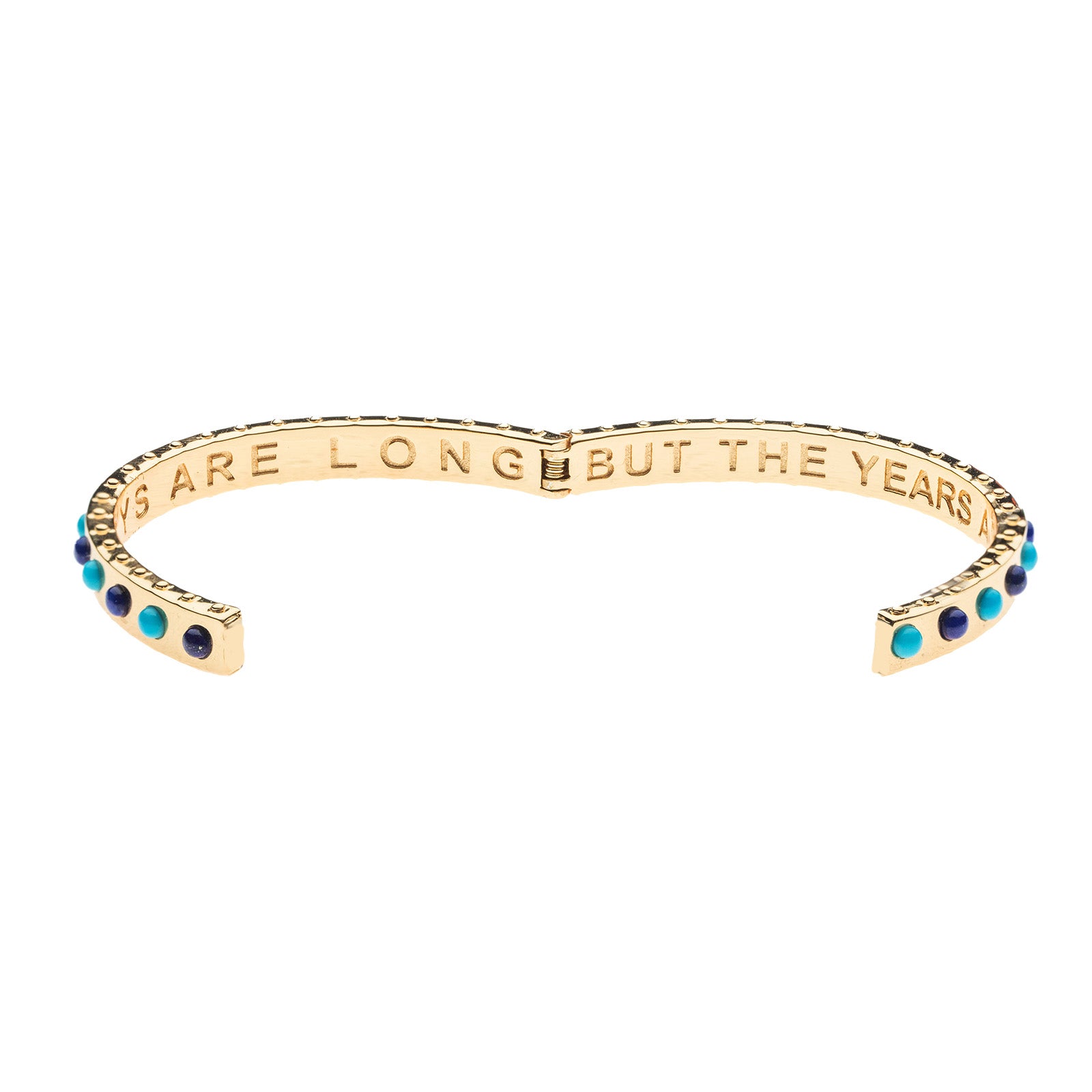 Cuff shown open to show the phrase inscribed inside: THE DAYS ARE LONG BUT THE YEARS ARE SHORT