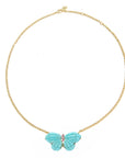 Stone butterfly necklace on gold chain features carved amazonite for the wings and pink tourmaline accents on the body