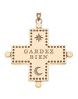 Back of gold Greek cross pendant features moon and star icons, as well as the phrase GARDEZ BIEN