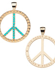 Front and back of the give peace a chance pendant. Back features the phrase GIVE PEACE A CHANCE.
