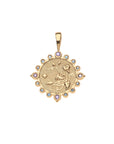 Gold petite embellished coin pendant features morning glory flowers and border of amethyst and tanzanite stones