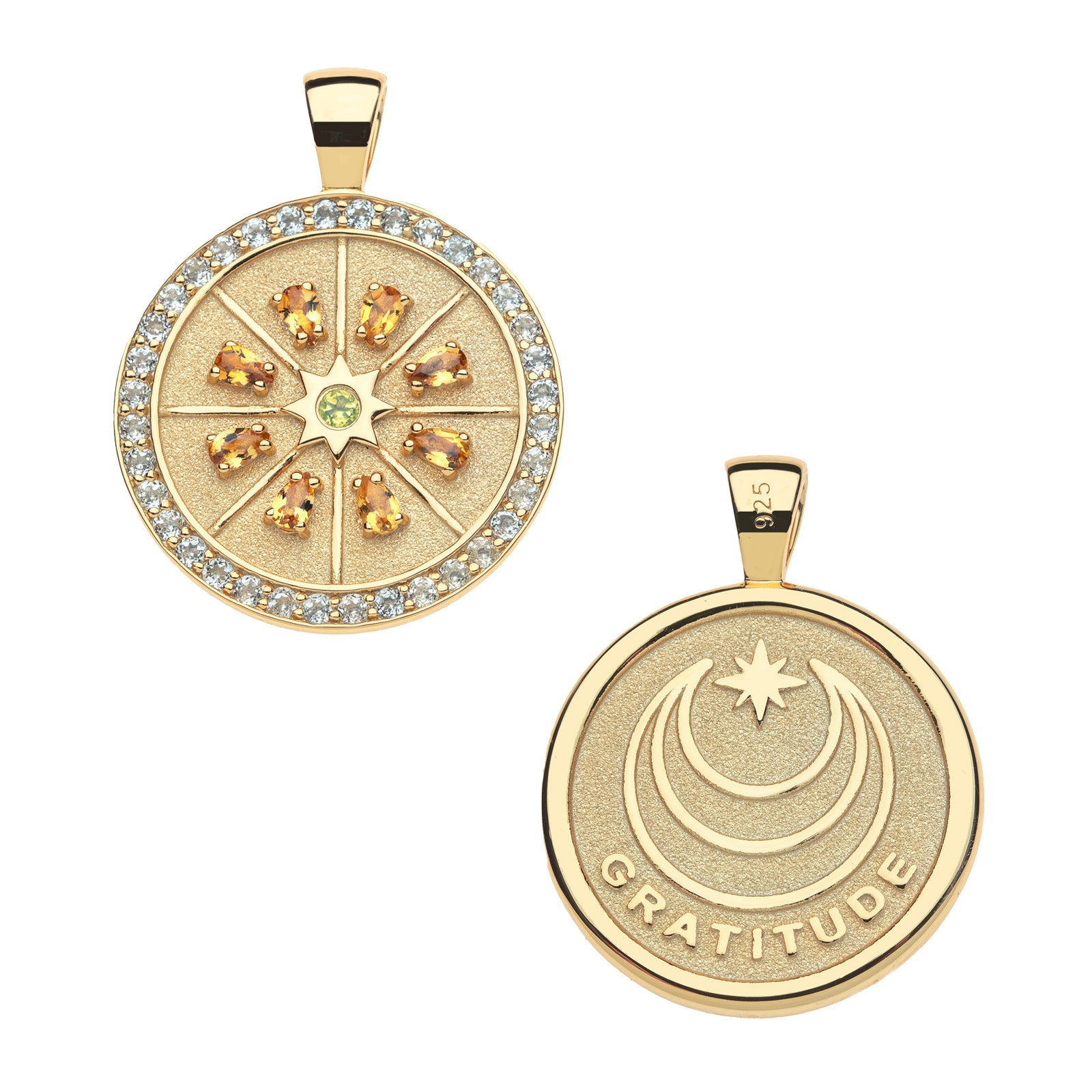 Front and back of gratitude citrus slice embellished coin. Back of coin features moon and star logo and the word GRATITUDE