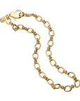 Gold chain necklace featuring alternating larger and smaller detailed links
