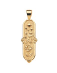 Gold elongated dogtag pendant features camellia flowers and stars