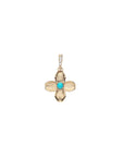 Gold dogwood flower pendant with turquoise cabochon center and white topaz details on bail