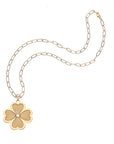 Gold dogwood flower pendant on drawn link chain