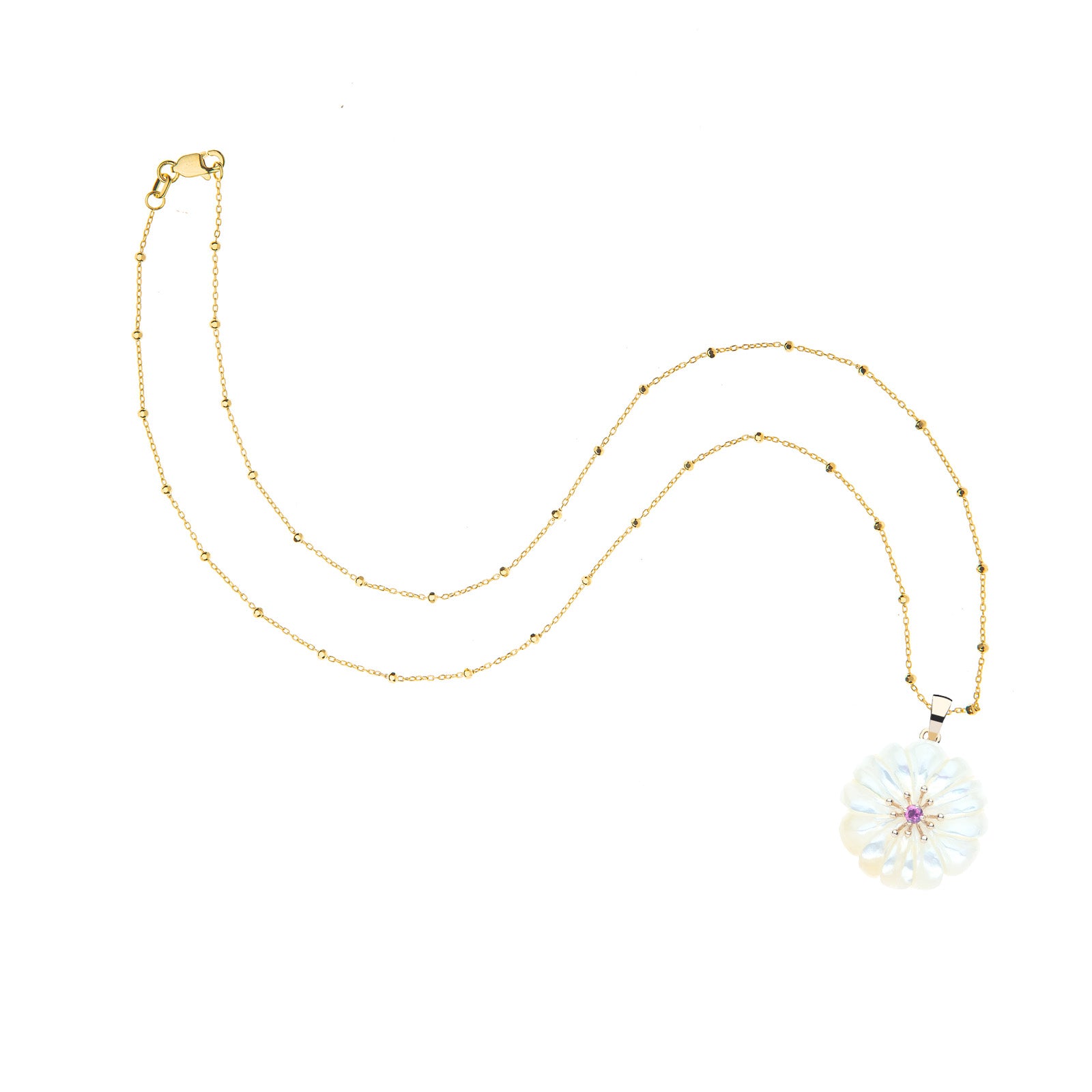Carved mother of pearl daisy on 14 karat satellite chain