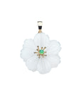 Camellia flower carved in white moonstone and set in gold with chrysoprase stone in the center