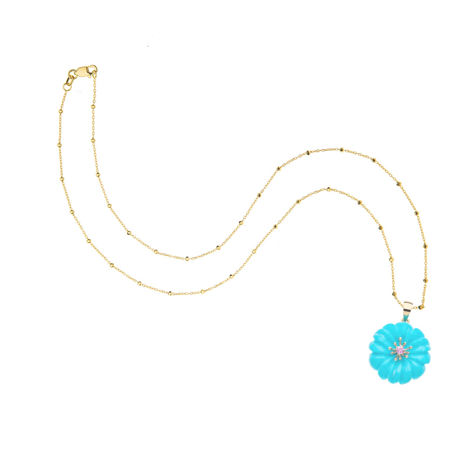 Carved daisy on 14 karat satellite chain