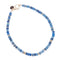 Kyanite beaded necklace with flat gold beads interspersed and oversized gold lobster clasp